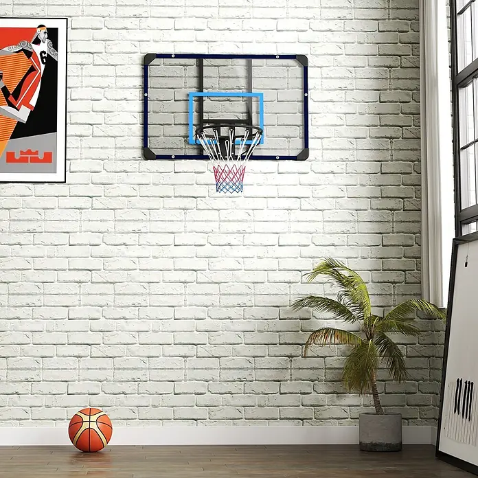Sportnow Basketballkorb - Stahl, Schwarz, Transparent, Blau - Mini-Basketballkorb mit transparenter Platte, blauem Rahmen und rot-blauem Netz, an einer Ziegelwand für den Innenbereich montiert.