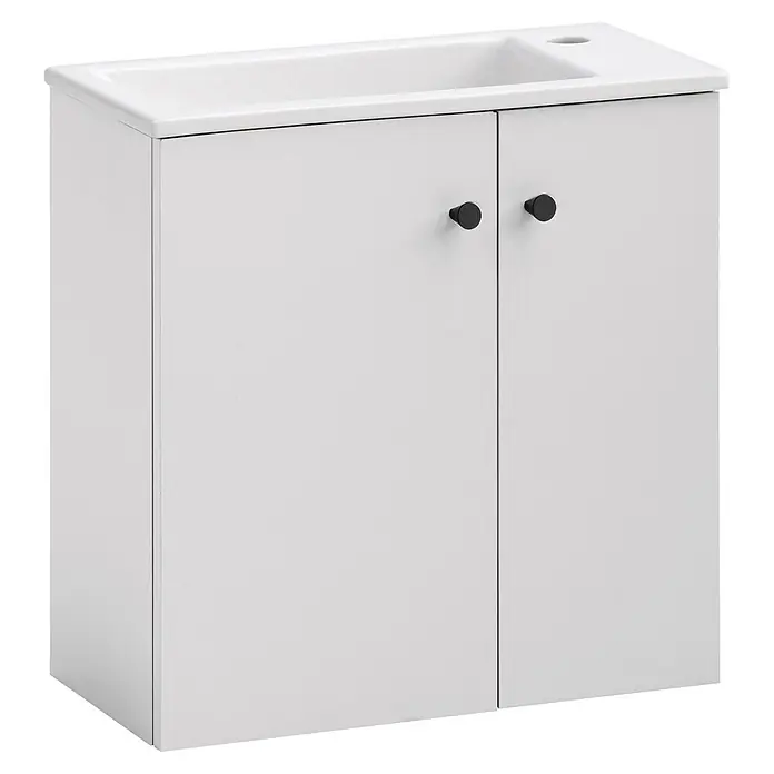 Schildmeyer Ebba Badmöbel-Set - Mattweiß - Weißer Badunterschrank mit integriertem Waschbecken und zwei Türen mit schwarzen Knöpfen.
