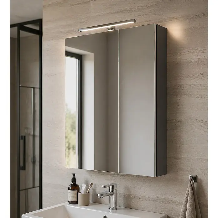 Schildmeyer LED-Spiegelschrank Sasso - B x H: 600 x 748 mm, Anthrazit - Eleganter Spiegelschrank mit integrierter LED-Beleuchtung, über einem modernen weißen Waschbecken montiert.