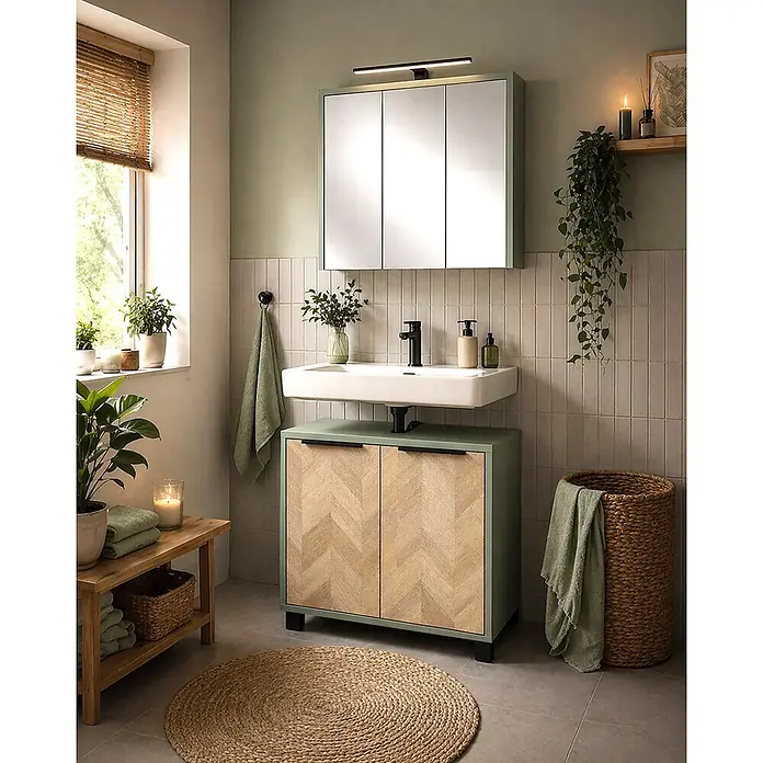 Schildmeyer Waschbeckenunterschrank Piazza - B x T x H: 651 x 330 x 536 mm, Pistazie/Eiche Chevron - Badezimmermöbel mit hellgrünem Rahmen und Fischgrät-Holztüren, trägt ein weißes Waschbecken.