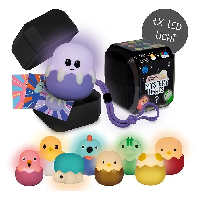 MegaLight LED-Nachtlicht Mystery Lights Eggys - 0,2 W, L x B x H: 45 x 45 x 50 mm, RGBW, Gesamtstückzahl: 1 Stk. - Eggy's Mystery Lights schwarze Box mit einer violetten, eiförmigen LED-Leuchte, umgeben von verschiedenen bunten LED-Charakterlichtern.
