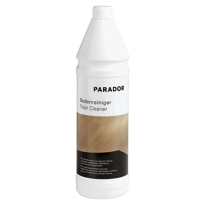 Parador Vinylboden Trendtime 6 - Eiche Natural Mix Grau, Schlossdiele, 2.200 x 216 x 9,6 mm - Weiße Parador Bodenreinigerflasche mit Holzfußbodendruck auf dem Etikett.