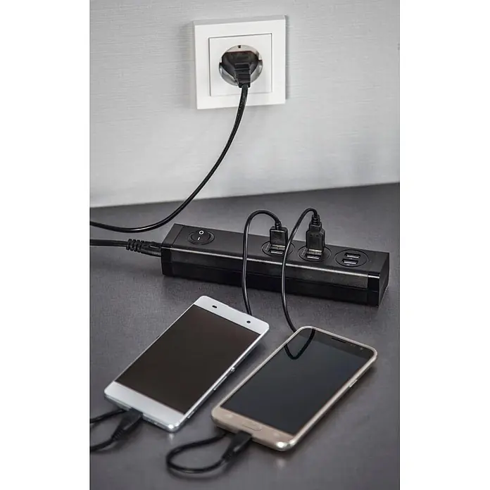 Hama USB-Adapter 00223201 6 Ports USB-A für Tablets und Smartphones 34W - Schwarz - Ein schwarzes Mehrfach-USB-Ladegerät mit Netzschalter, an eine Steckdose angeschlossen, lädt zwei Smartphones.