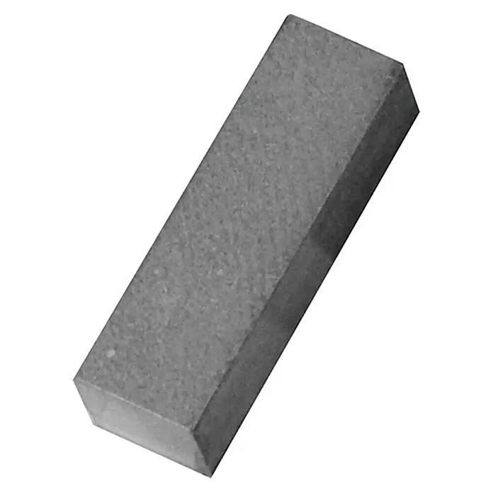 Wannen-Gummi8 x 2,5 x 2 cm - Nahaufnahme eines rechteckigen Schleifsteins in Grautönen, der zum Schärfen von Werkzeugen verwendet wird.