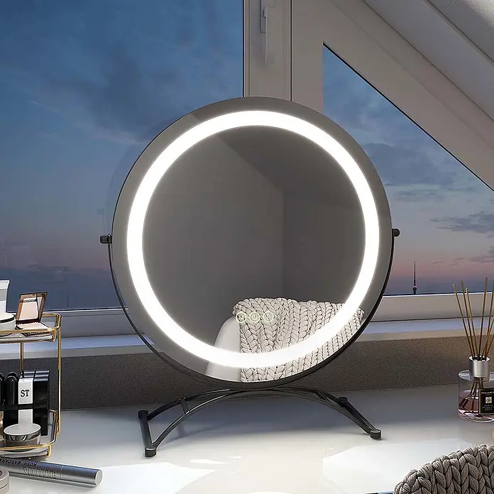 Emke Kosmetikspiegel CM07 - 40 x 47 cm, Rund, Schwarz - Runder LED-beleuchteter Kosmetikspiegel mit dunklem Rahmen und Touch-Bedienung auf einem Schminktisch.