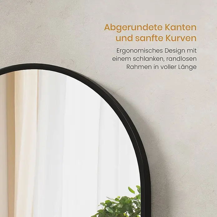 Emke Standspiegel - 60 x 160 cm, Glas - Schlanker Ganzkörperspiegel mit schwarzem Rahmen und abgerundeter Oberseite, der einen Raum reflektiert.