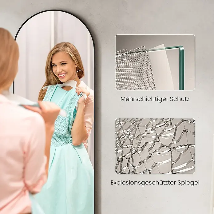 Emke Standspiegel - 60 x 160 cm, Glas - Bogenförmiger Spiegel mit Frau beim Kleideranprobieren. Mit mehrschichtigem und explosionsgeschütztem Sicherheitsglas.