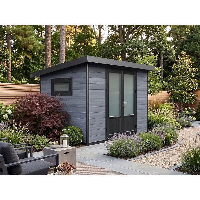 Fjordholz Gartenhaus Style DeLuxe 5,8 m² - Außenmaß inkl. Dachüberstand (B x T): 290 x 200 cm, Aluminium, Anthrazit/grau - Moderner grauer Gartenschuppen mit schwarzen Zierleisten und Türen, eingebettet in eine grüne Landschaft.