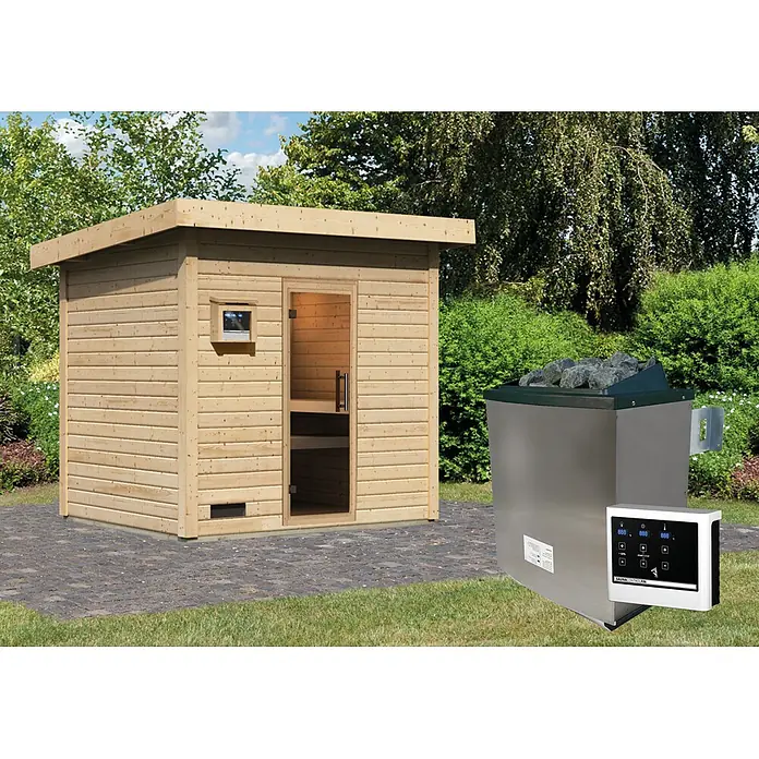 Karibu Saunahaus Kaapi 4 - 9 KW Ofen mit externer Steuerung, Natur, L x B x H: 196 x 231 x 238 cm - Helle Holz-Außensauna mit Flachdach, daneben ein silberner Saunaofen mit Steinen und digitaler Steuerung.