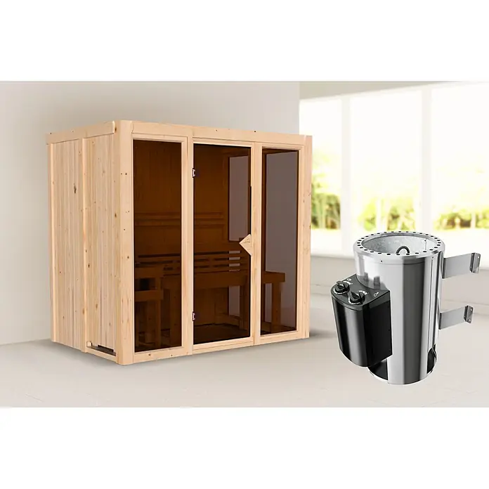 Karibu Elementsauna Balder - L x B x H: 138 x 216 x 198 cm, Plug & Play 3,6 KW Ofen mit interner Steuerung - Helle Holzsauna mit Glastüren und Bänken, daneben ein zylindrischer Edelstahl-Saunaofen, in einem hellen Raum.