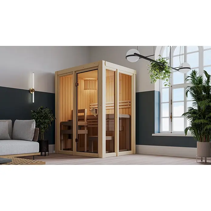 Karibu Elementsauna Balder - L x B x H: 122 x 155 x 198 cm, Plug & Play 3,6 KW Ofen mit interner Steuerung - Hölzerne Saunakabine mit Glastüren in einem modernen Raum, ausgestattet mit Innenbänken und Beleuchtung.