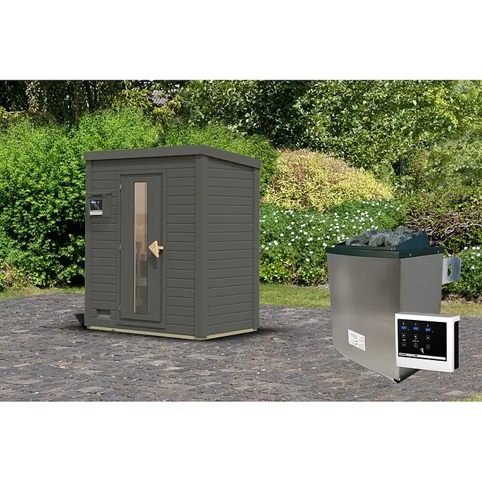 Karibu Saunahaus Hytti - 9 KW Ofen mit externer Steuerung, Terragrau, L x B x H: 113 x 196 x 228 cm - Graue Outdoor-Saunakabine aus Holz mit Glastür und ein Edelstahl-Saunaofen mit Bedienfeld, im Garten platziert.