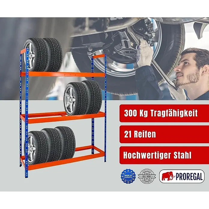 Proregal Reifenregal Tiger XL - Stecken, Blau-Orange - Blau-oranges Metallregal zur Reifenlagerung mit mehreren Reifen darauf, im Kontext einer Autowerkstatt.