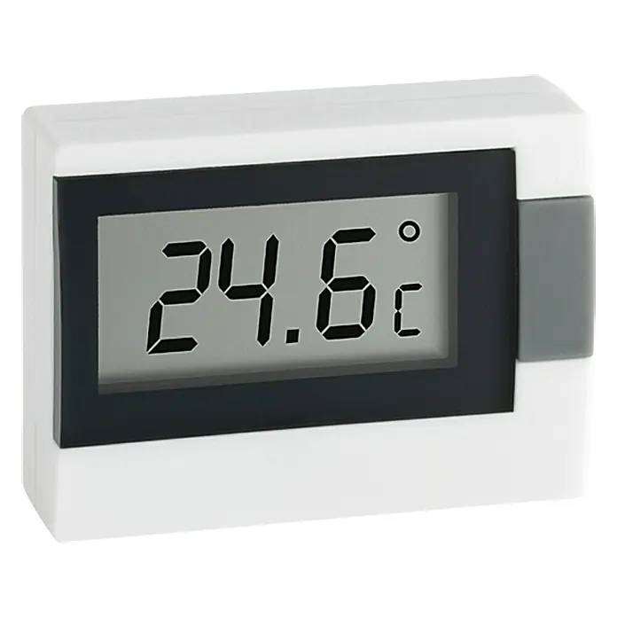 TFA Dostmann Termómetro - Digital, L x An x Al: 1,6 x 5,4 x 3,9 cm, Blanco - Un termómetro digital que muestra una lectura de 24,6 grados Celsius. El termómetro tiene una carcasa blanca sencilla y una pantalla gris.