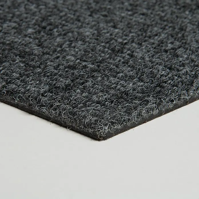 Bricoflor Teppichfliese -  - Dunkelgraue Schlingenflor-Schmutzfangmatte mit schwarzer Gummirückseite, schräg dargestellt.