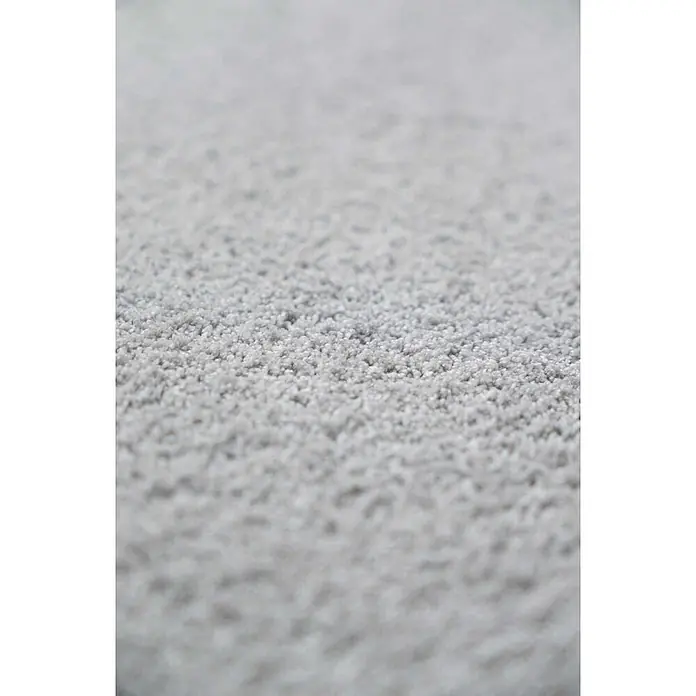 Bricoflor Teppichfliese - Breite: 50 cm, Velours, grau - Nahaufnahme von weichem, hellgrauem Teppich mit kurzem, texturiertem Flor.