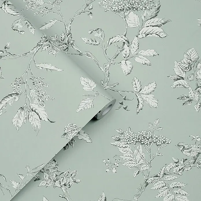 Laura Ashley Vliestapete Vliestapete Elderwood - Blau, Floral, 10 x 0,52 m - Hellgrüne Tapetenrolle mit monochromem botanischem Muster aus Zweigen, Blättern, Beeren und Vögeln, teils ausgerollt.