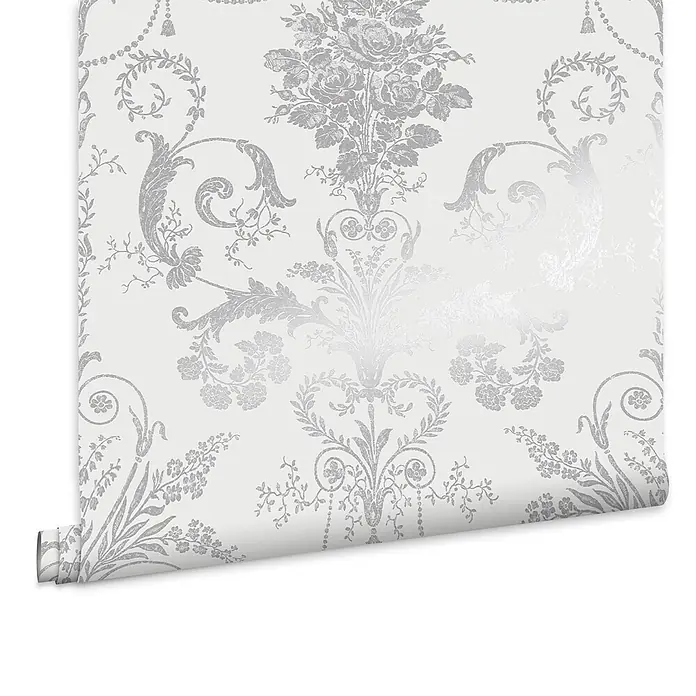 Laura Ashley Vliestapete Josette Damast - Silber, Ornament, 1.000 x 52 cm - Weiße Tapetenrolle mit schimmerndem silbernem, floralem Damastmuster.