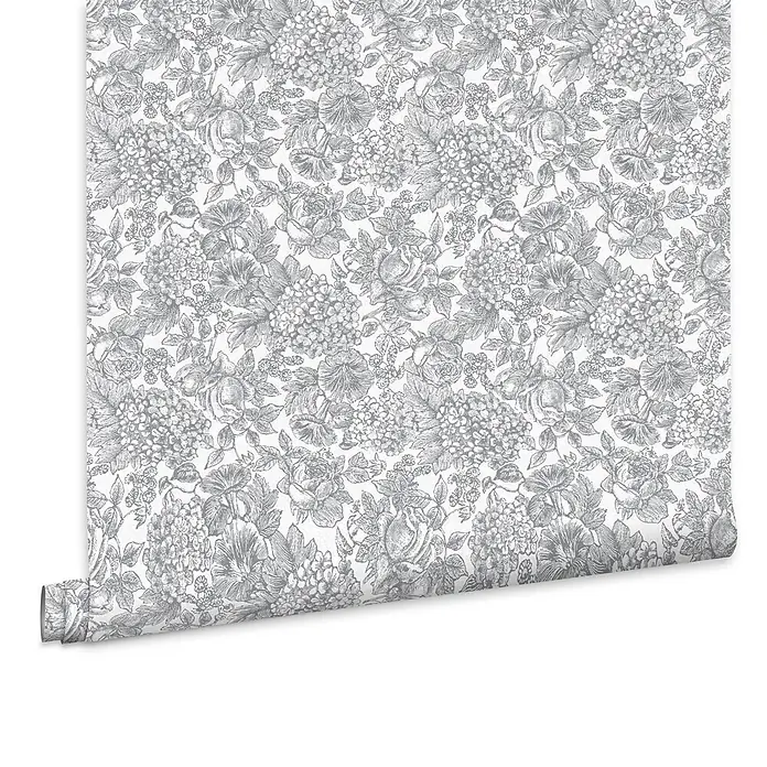 Laura Ashley Vliestapete blühende Hortensie - Grau, Floral, 1.000 x 52 cm - Teilweise abgerollte Tapetenrolle mit grauem Blumenmuster.