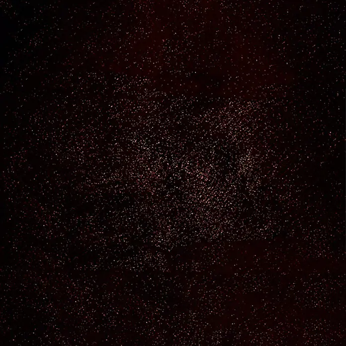 SCHÖNER WOHNEN-Farbe Trendstruktur Farbeffektputz Glimmer-Optik Effektlasur - Granat, Schimmernd, 1 l - Dunkler, funkelnder Hintergrund mit subtilen Farbverläufen und feinen, glitzernden Partikeln, die eine elegante Tiefe erzeugen.