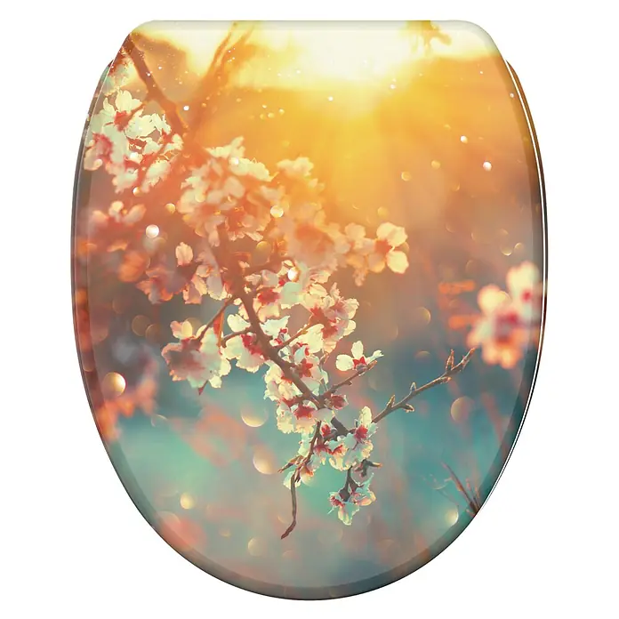 SANILO WC-Sitz Kirschblüte mit Schnellverschluss - MDF, Orange, Mit Absenkautomatik - WC-Sitz mit einem Design aus weißen Blüten vor einem warmen, sonnigen Bokeh-Hintergrund.