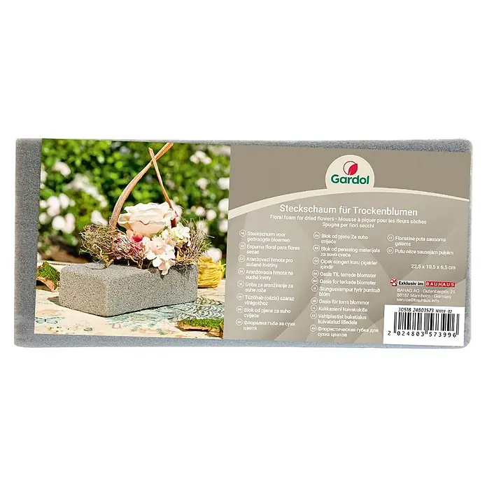 Gardol Steckmasse - 22,5 x 10,5 x 6,5 cm, Geeignet für: Trockenblumen - Grauer Steckschaum-Block für Trockenblumen-Arrangements, teilweise in einem kleinen Dekorationsstück gezeigt.