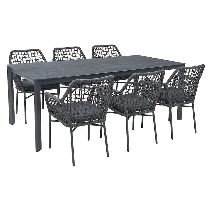 Acamp Gartenmöbel-Set Rom/Rom - 7 -tlg., Aluminium, TexRope, Anthrazit - Dunkelgraue Outdoor-Essgruppe: rechteckiger Tisch mit sechs Stühlen aus Seilgeflecht und dunklen Kissen.