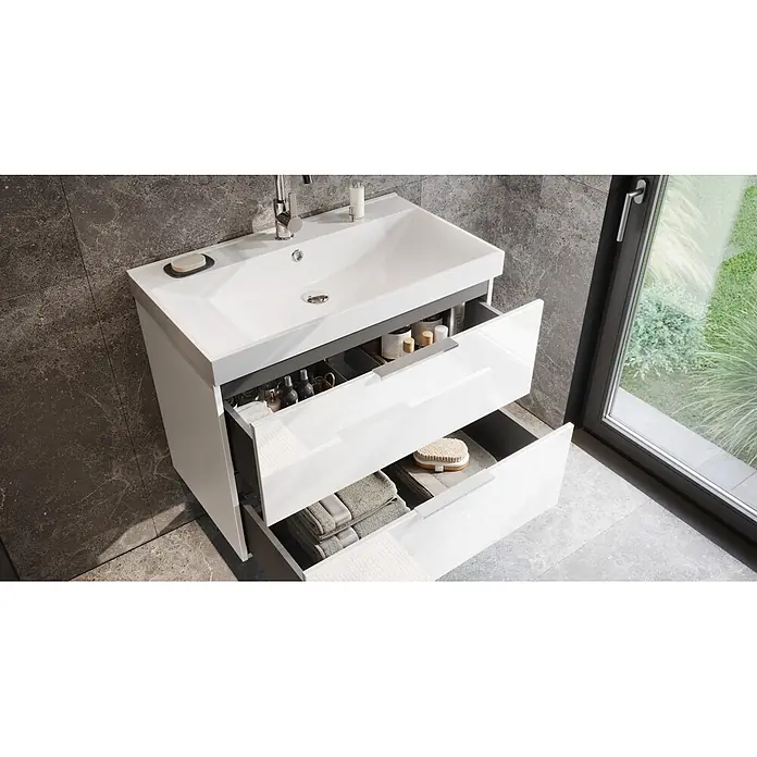 Germania Waschtischunterschrank GW-CELANO - B x T x H: 81 x 46 x 65 cm, Weiß - Weißer Badunterschrank mit integriertem Waschbecken und zwei geöffneten Schubladen mit Pflegeprodukten und Handtüchern.