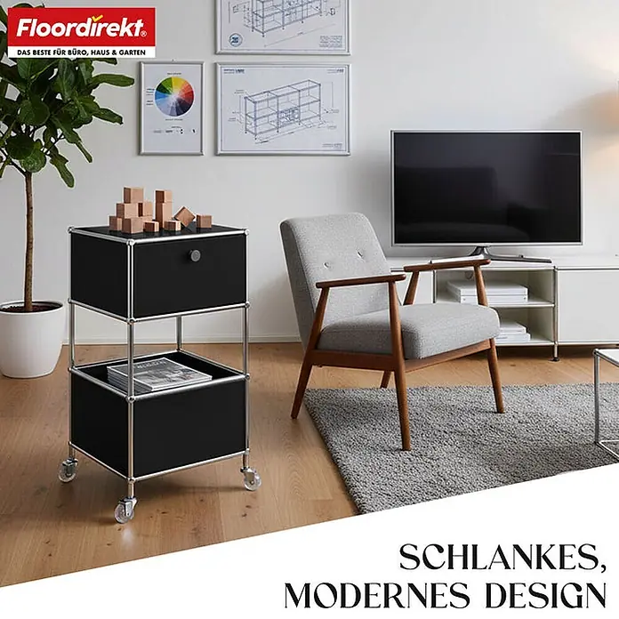Floordirekt Metallregal Concept Epure MK-145 - 40 x 40 x 75 cm Schwarz - Anzahl Böden: 3 Stk., Schrauben, Schwarz - Schwarzes modulares Aufbewahrungsmöbel auf Chromgestell mit Schublade und offenem Fach, auf Rollen, in einem modernen Raum.