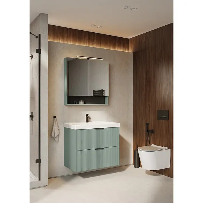 Riva Yasumi Waschtischunterschrank - B x T x H: 80 x 45,2 x 63,5 cm, Sage, Matt - Modernes Badezimmer mit salbeigrüner geriffelter Waschtischplatte, weißem Waschbecken, wandhängendem WC und schwarzen Armaturen.
