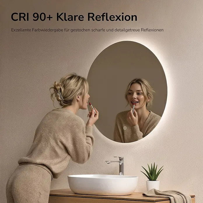 Emke Lichtspiegel Glowrim OLM03 - 70 x 70 cm - Runder LED-beleuchteter Spiegel in einem modernen Bad, von einer Frau beim Lippenstiftauftragen genutzt.