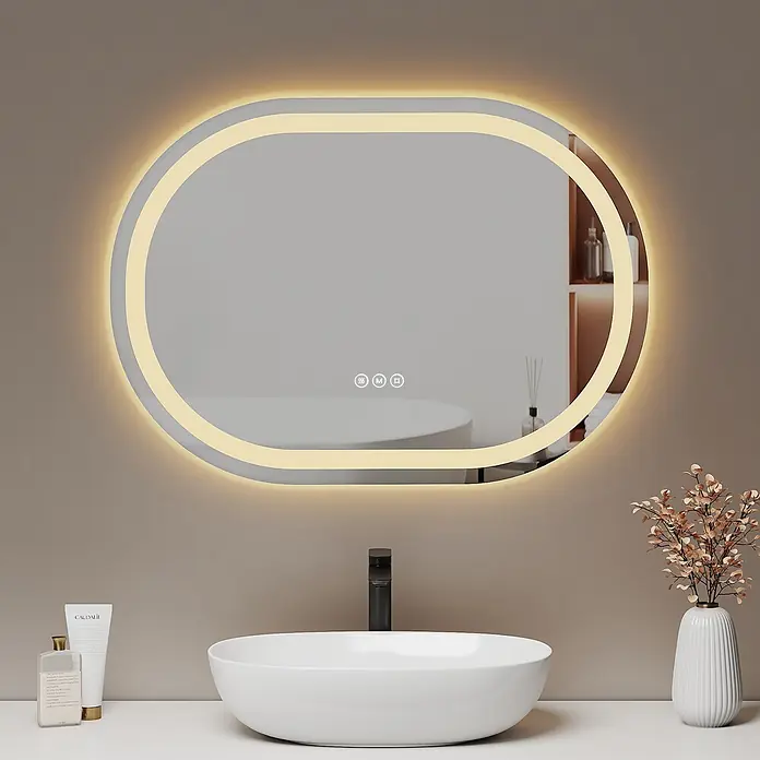 Emke Lichtspiegel Dimlite OLM06 -  - Ovaler LED-Badezimmerspiegel mit warmer Hintergrundbeleuchtung und Touch-Steuerung über einem weißen Waschbecken.
