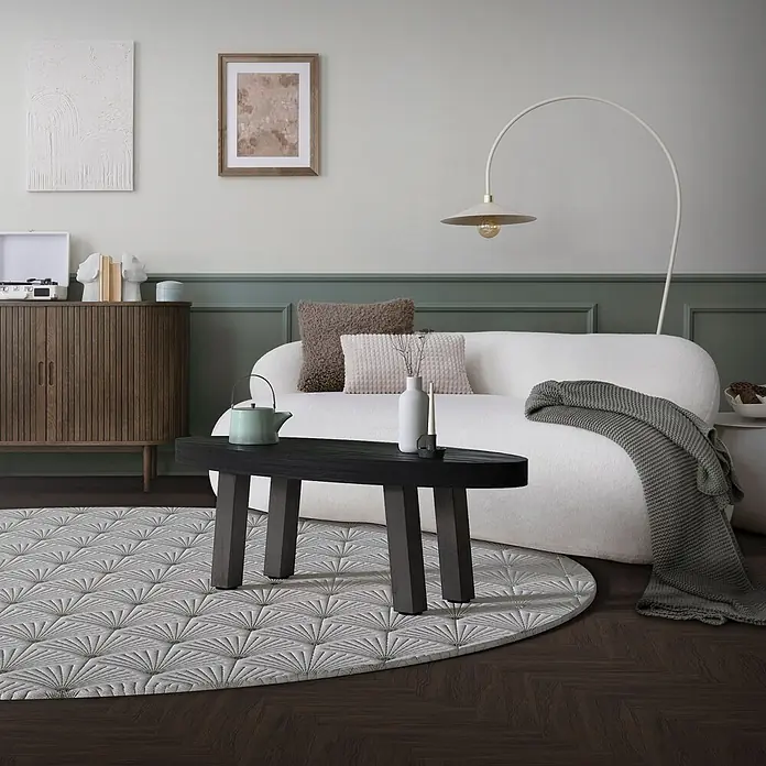 ML-Design Tischgestell Bankkufen I-Design 42cm Industrial glänzend Möbelbeine 96° Neigung - Traglast: 500 kg, Stahl - Runder, hellgrauer Teppich mit geometrischem Fächermuster unter einem schwarzen ovalen Couchtisch.