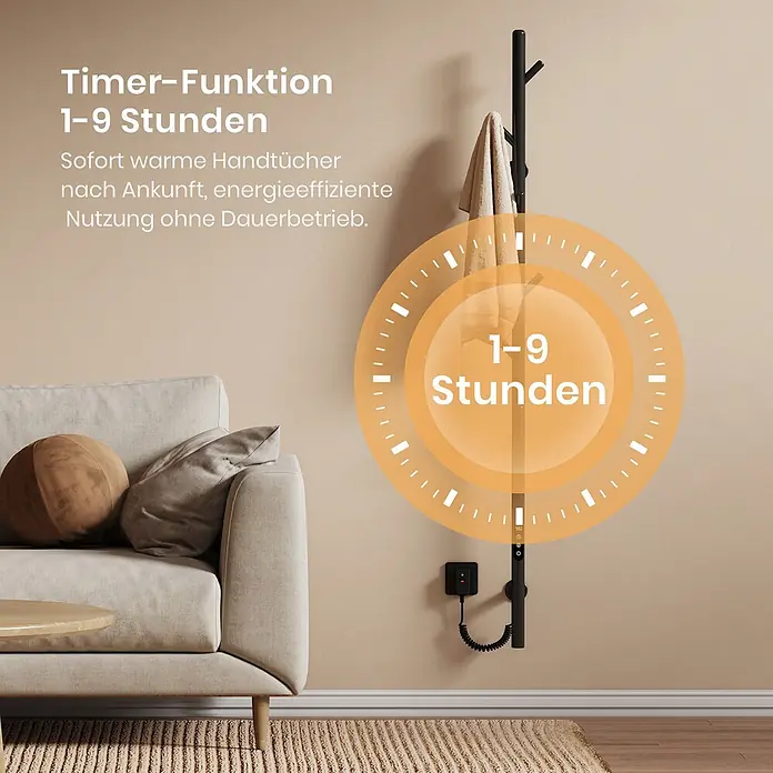 Emke Elektro-Badheizkörper Orbrad PHR -  - Schwarzer Handtuchwärmer mit 1-9 Stunden Timerfunktion, hält Handtücher warm, platziert in einem modernen Wohnzimmerambiente.