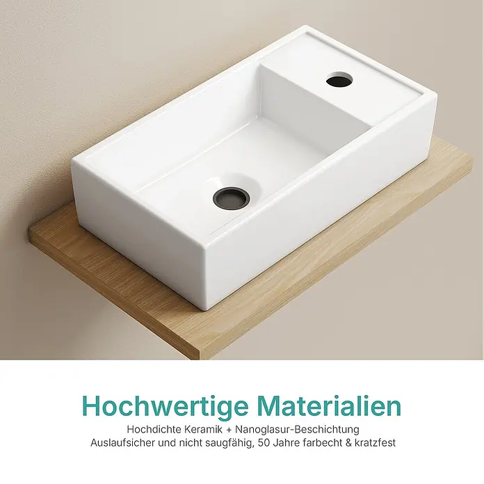 Emke Aufsatzwaschbecken Ceraedge CB24 - 22,3 x 41,6 cm, Hahnloch: Sonstige, Ohne Überlauf, Weiß - Weißes, rechteckiges Keramik-Aufsatzwaschbecken mit dunklem Abfluss und Hahnloch auf einem Holzregal.
