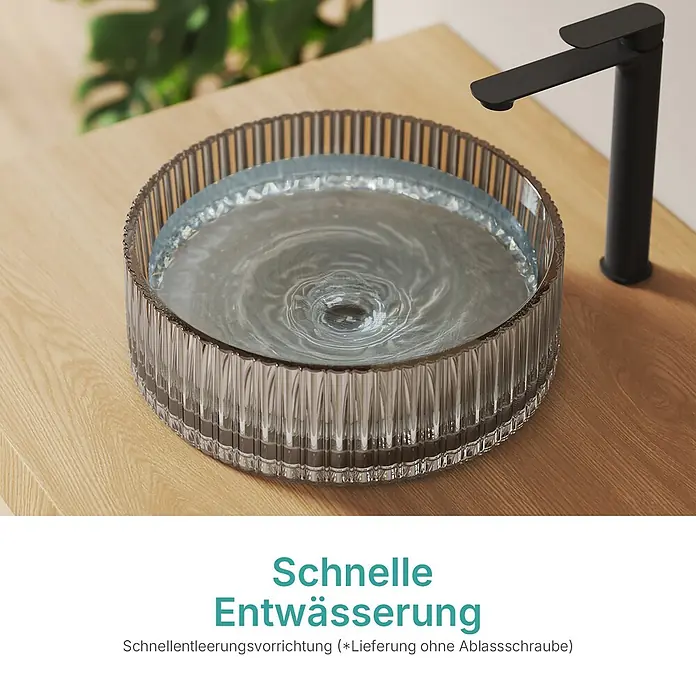 Emke Aufsatzwaschbecken Loviton CB32 - Hahnloch: Ohne, Ohne Überlauf, Grau - Rundes, geriffeltes Glaswaschbecken mit abfließendem Wasser und schwarzem Wasserhahn auf Holzplatte. Für schnelle Entwässerung.