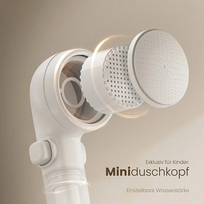 Emke Duschsystem Orbflow F09 - Mit Thermostatarmatur, Lochabstand: 70,7 cm, Anzahl Strahlarten: 3 Stk., Weiß - Weißer Miniduschkopf für Kinder, teilweise zerlegt, um den internen Filter und Sprühplatten mit einstellbarer Wasserstärke zu zeigen.