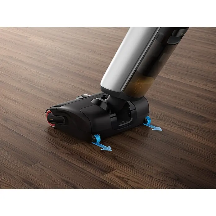 Mova Aspirador en seco y húmedo de batería X4 Pro - 450 W, Volumen de recipiente: 760 ml - Cabezal limpiador de suelos negro y plateado con depósito de agua sucia sobre suelo de madera, flechas azules resaltan las ruedas.