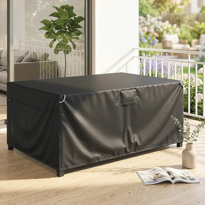 Outsunny Loungemöbel-Schutzhülle - 420D Oxford-Gewebe, Schwarz - Schwarze, wasserdichte Outdoor-Möbelabdeckung auf einem Balkon, die einen rechteckigen Tisch schützt. Mit blauen Nähten und Zurrgurten.