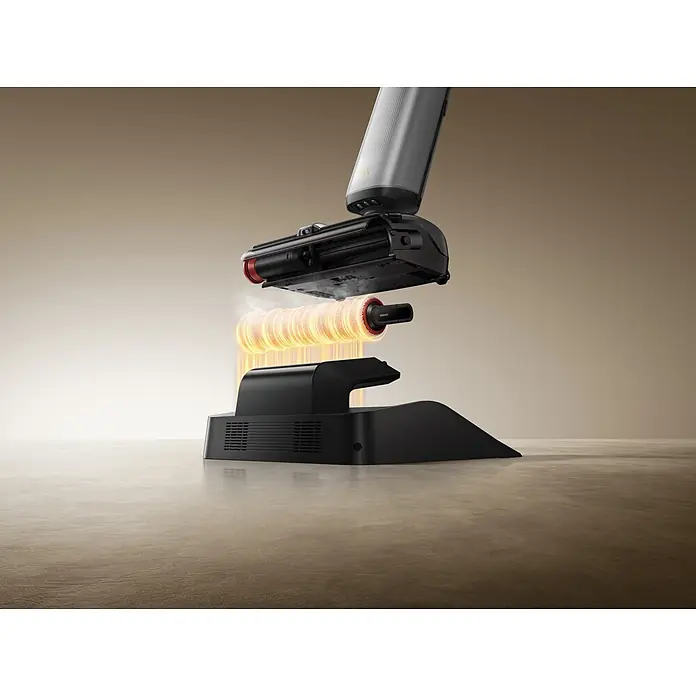 Mova Aspirador en seco y húmedo de batería X4 Pro - 450 W, Volumen de recipiente: 760 ml - Un cabezal de aspiradora negro y gris se separa de su base, revelando un rodillo naranja brillante y caliente para secado o autolimpieza.