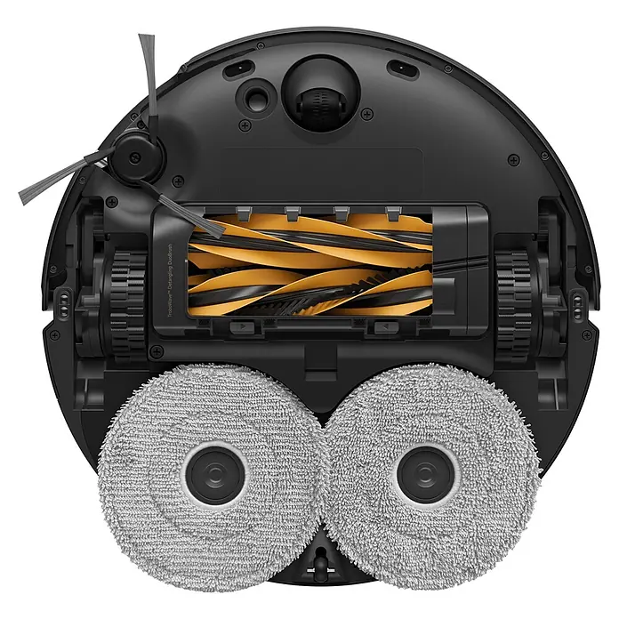 Mova Robot aspirador con mopa V50 Ultra Complete - Potencia de aspiración: 24.000 Pa, Capacidad del robot: 300 ml - Parte inferior de un robot aspirador negro con dos cepillos laterales grises, un cepillo principal central naranja y negro, y dos almohadillas de mopa grises.
