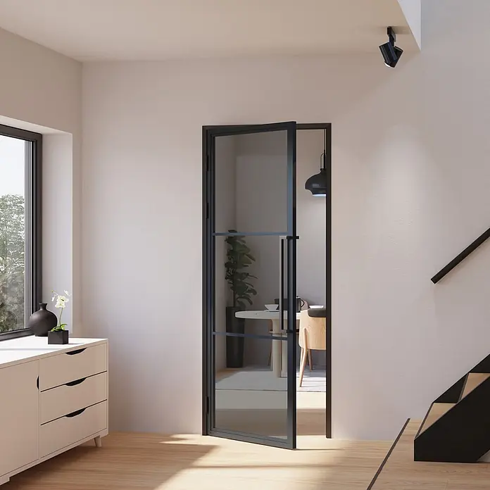 Inova Zimmertür Glasdrehtür ESG Glastür Komplettset Grauglas DIN Links Schwarz - 834 x 1.972 mm, DIN Anschlag: Links, Schwarz - Schwarze Glas-Drehtür mit Metallrahmen, halb offen, verbindet zwei Räume.