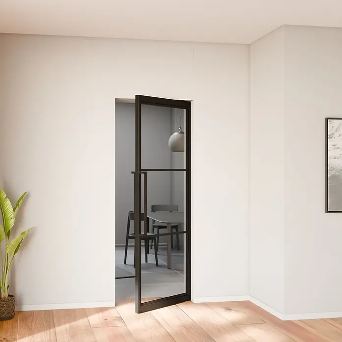 Pivot Schwingtür Loft 830x2115mm Stahl 3 Felder Klarglas schwarz -  - Schwarze Glasdrehtür mit Rahmen, die zwei moderne Räume trennt und ihr schlankes Design hervorhebt.