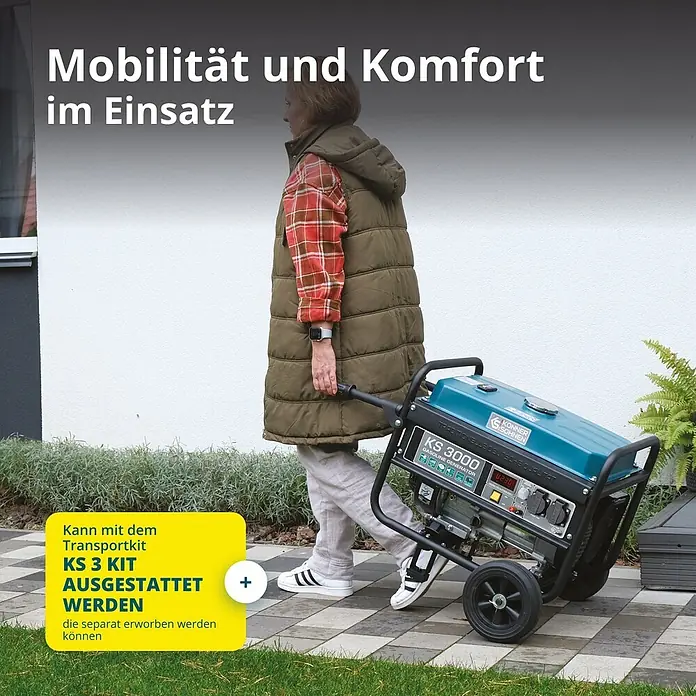 Könner & Söhnen Stromerzeuger KS 3000 - Nennleistung: 2,6 kW, Tankvolumen: 15 l - Eine Person zieht einen blauen KS 3000 Benzingenerator auf Rädern über einen Weg, für Mobilität und Komfort im Einsatz.