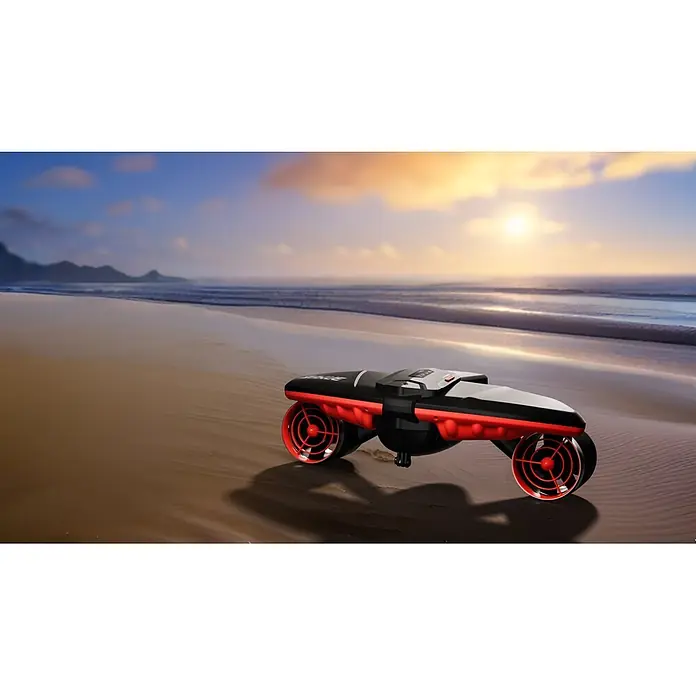 Sublue Tauchscooter Navbow 2026 - L x B x H: 486 x 327 x 177 mm - Schwarzer und roter Wasserscooter mit sichtbaren Antriebsdüsen ruht an einem Sandstrand bei Sonnenuntergang.