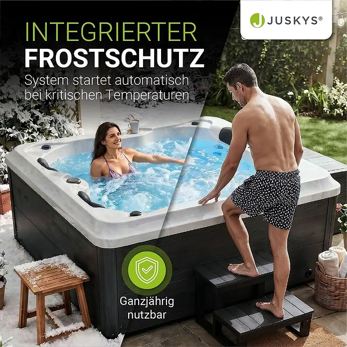 Artsauna Außen-Whirlpool Oasis - 160 x 210 x 80 cm, Anthrazit - Dunkelgrauer und weißer Whirlpool im Schnee, ein Paar genießt ihn, betont die ganzjährige Nutzbarkeit.