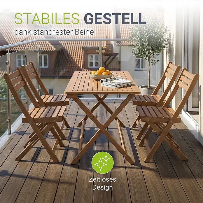 Juskys Gartentisch-Set Rimini - Gesamtumfang: 5 -tlg., L x B x H: 42 x 120 x 91 cm, Akazienholz, Klappbar - Hölzernes Balkonmöbel-Set mit Klapptisch und vier Klappstühlen auf einem Balkon.