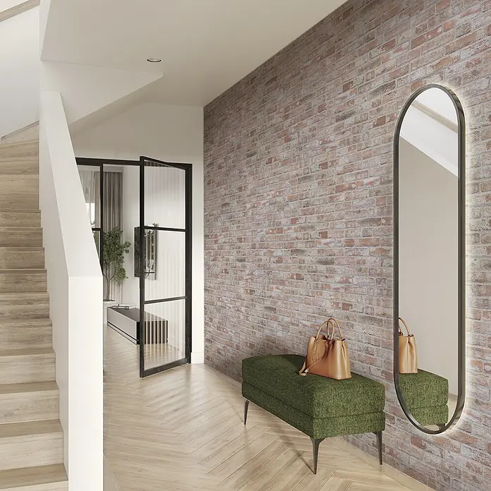 Panel de pared Ultra - 67 x 25 cm, Arcilla blanco, 6 ud. - Banco tapizado verde con patas oscuras, ubicado en un pasillo moderno con pared de ladrillo.
