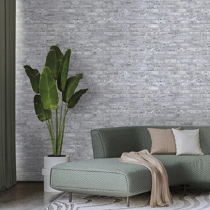 Panel de pared Ultra - 67 x 25 cm, Gris, 6 ud. - Papel pintado de ladrillo gris instalado en una pared de salón moderno.