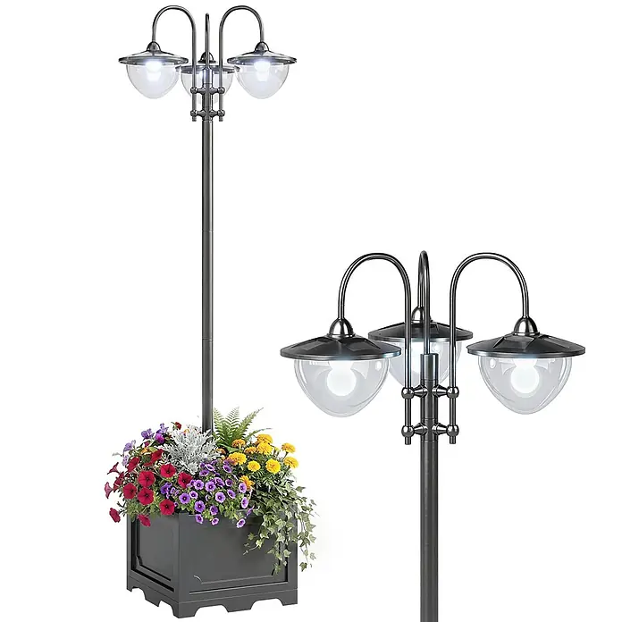 Outsunny Solar-Stehleuchte - 1,92 W, Schwarz - Dunkelgrauer dreifacher Laternenpfahl mit integriertem Blumenkasten, gefüllt mit bunten Blumen und Grünpflanzen.